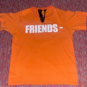 Kids large orange with white words vlone shirt